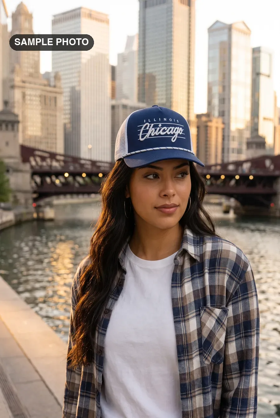Sample photo: woman in a navy Illinois Chicago trucker cap on the Chicago Riverwalk
