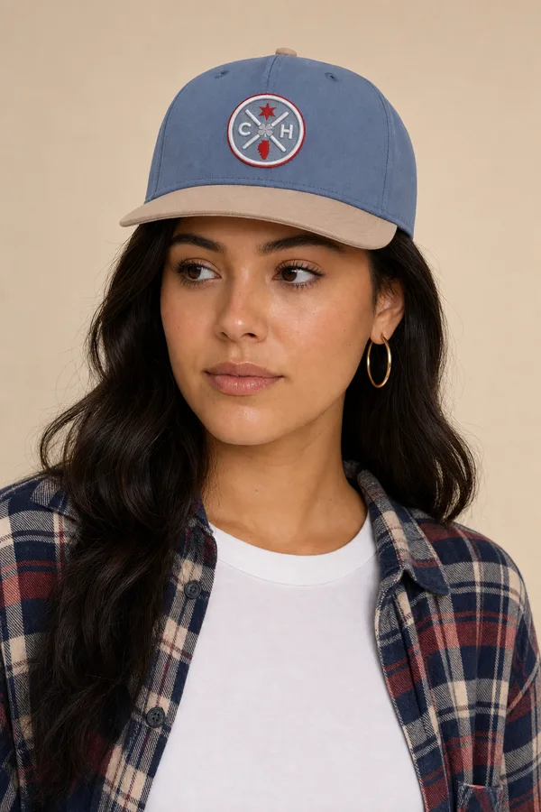 Woman in a blue patch cap