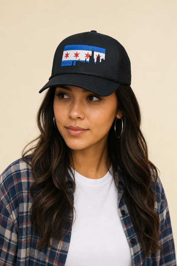 Woman in a black Chicago flag cap